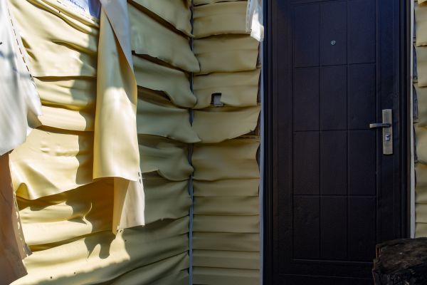 Cost of Melted Siding Replacement in Macomb